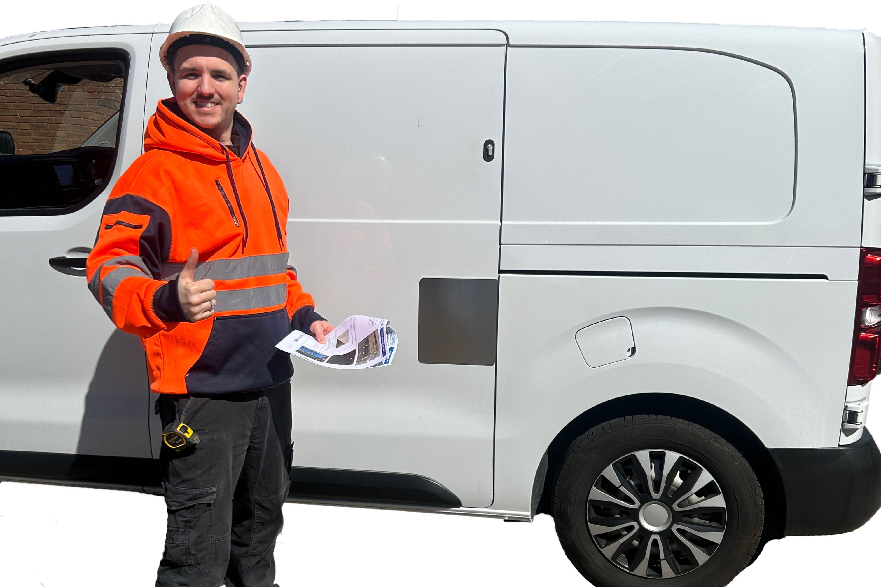 Tradesman standing next to his van after he has fitted the shield himself
